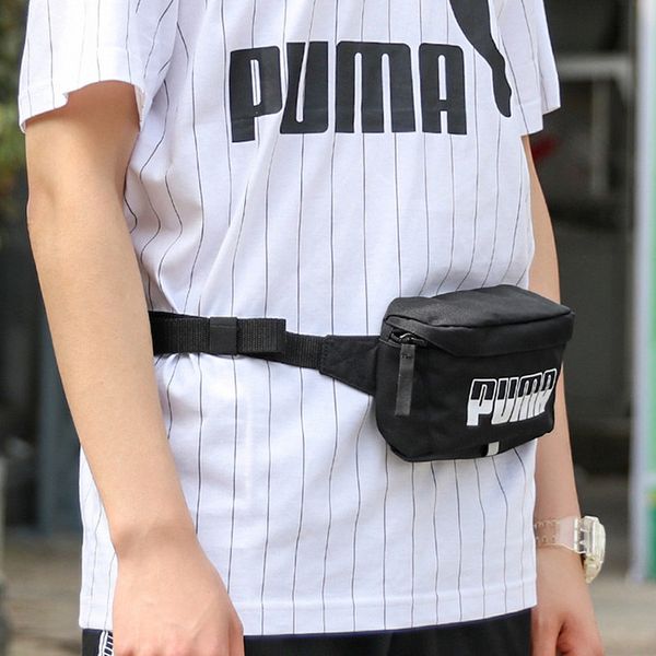 PUMA () ()