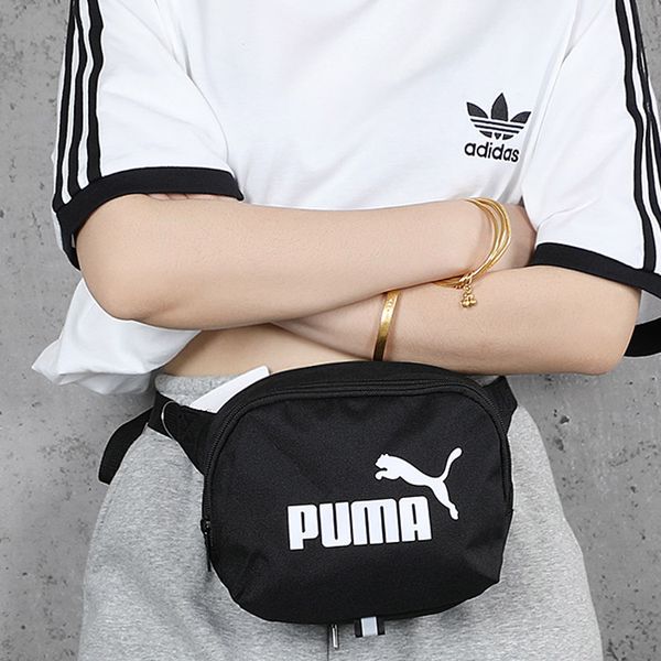 PUMA () ()