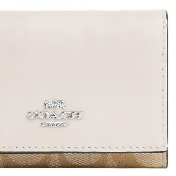 COACH ()